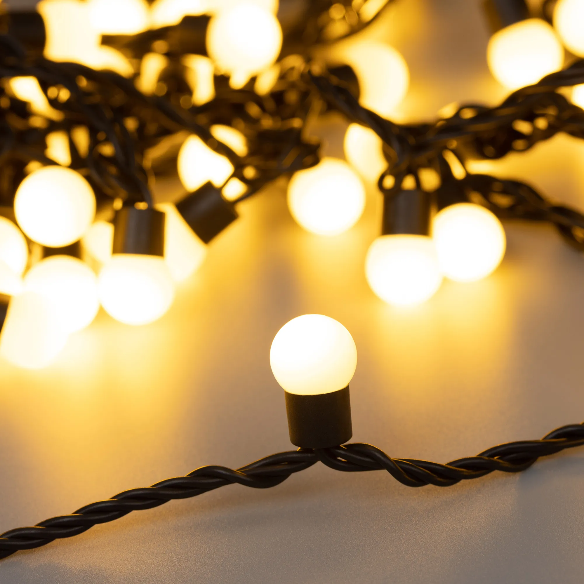 Светодиодная гирлянда ARD-BALL-CLASSIC-D17.5-10000-BLACK-100LED WARM (230V, 7W) (Ardecoled, IP65) - изображение товара